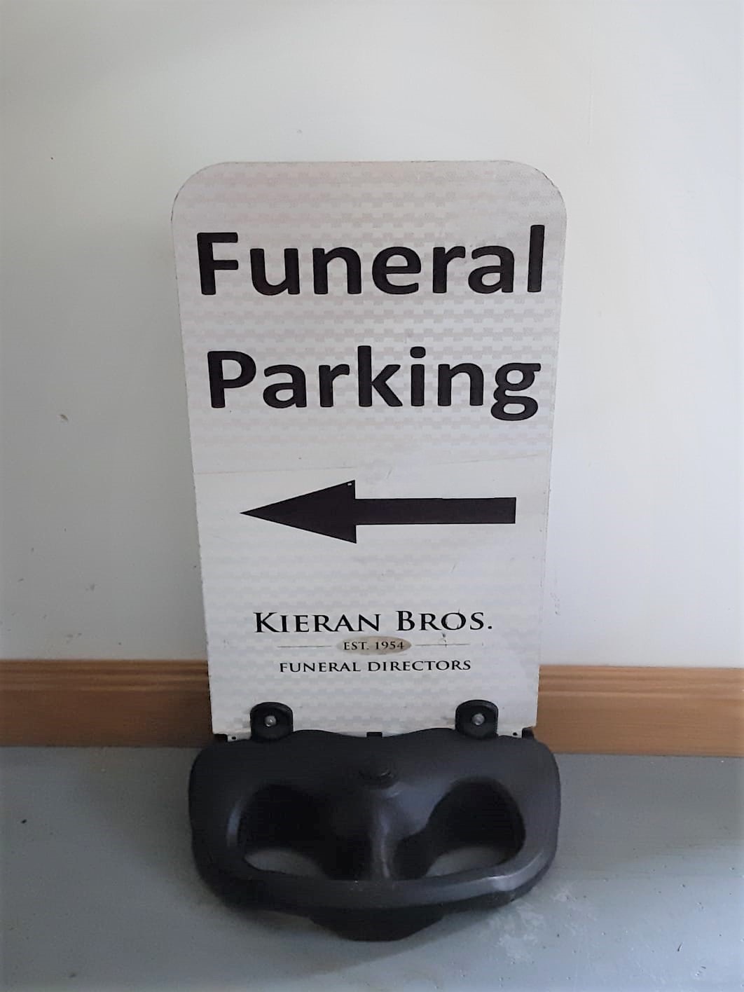 Two-sided footpath funeral sign